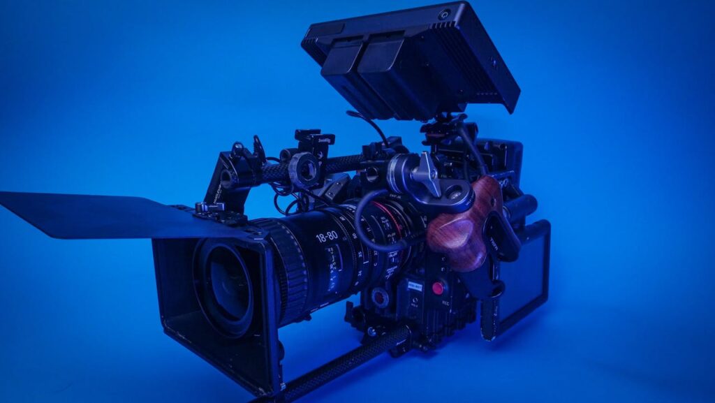 RTL setzt 2026 auf Stefan Raab: Neue Late-Night-Formate, Primetime-Shows und komplettes Archiv Close-up of a professional video camera with matte box and accessories on a blue background.